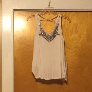 Beaded top with a cross back!